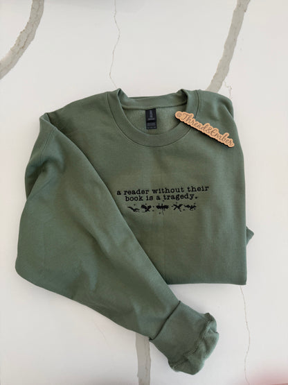 A Reader Without Their Book Is a Tragedy | Embroidered Bookish Crewneck